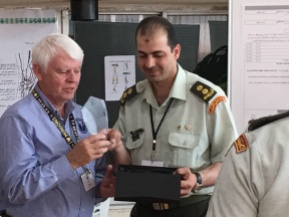Presenting a plaque to Sa'ed Smadi, Chair of OT JRMS